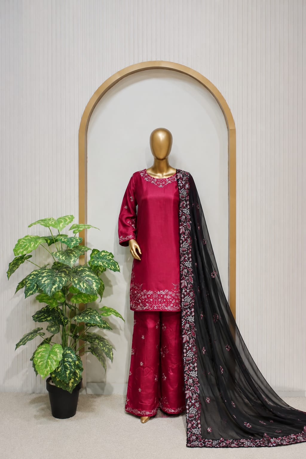 Designer Maroon 3-Piece Embroidered StitchedDress with Black Dupatta Maroon embroidered 3-piece stitched suit with a black embroidered chiffon dupatta and matching plazzo